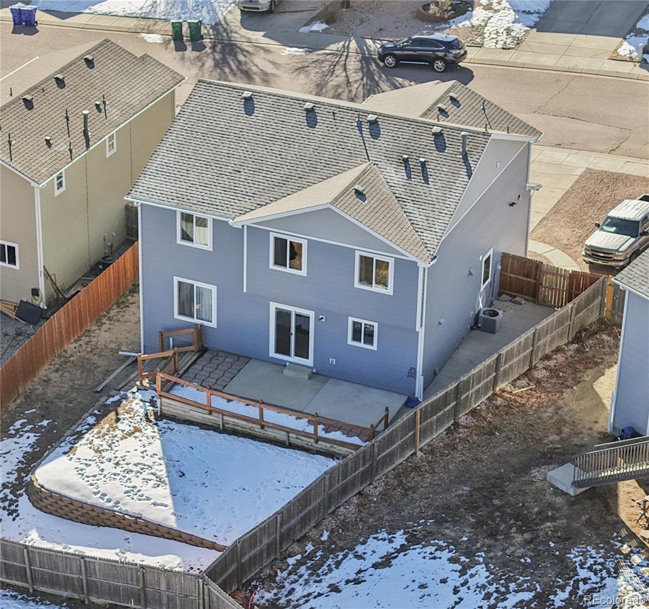 795 Winebrook Way Fountain, CO 80817 - Photo 33 of 41 a aerial view of a house with a yard and balcony