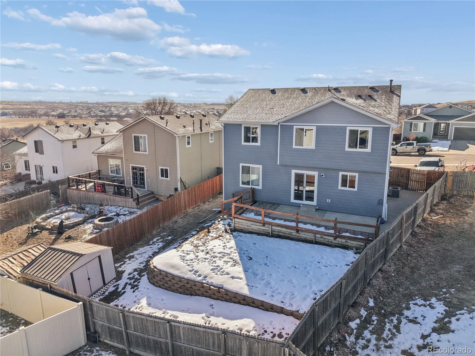 795 Winebrook Way Fountain, CO 80817 - Photo 36 of 41 a view of a house with a roof deck