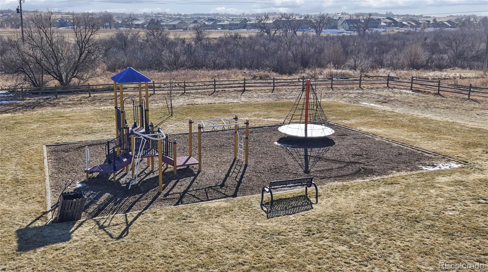 795 Winebrook Way Fountain, CO 80817 - Photo 39 of 41 a view of a lake with a yard