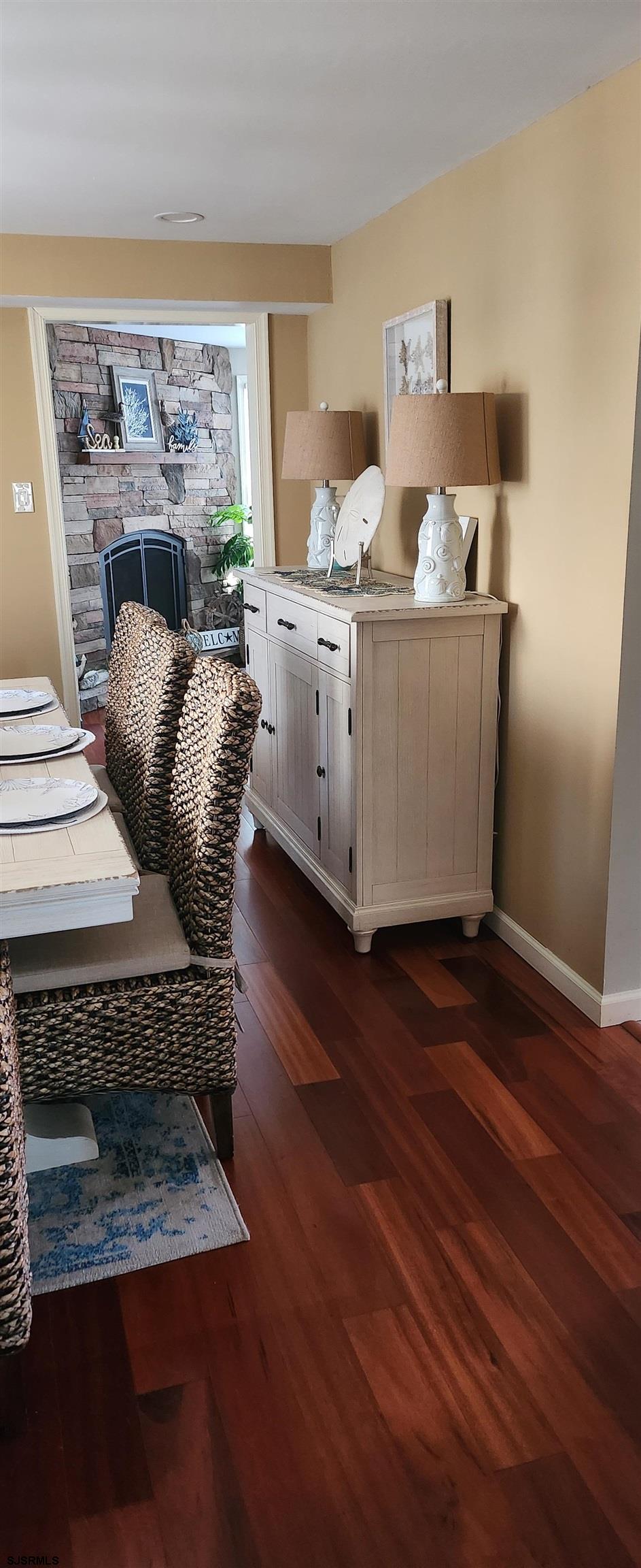 5217 Harbor Beach Boulevard, Unit SEA POINT Brigantine, NJ 08203 - Photo 27 of 38 a living room with furniture and wooden floor