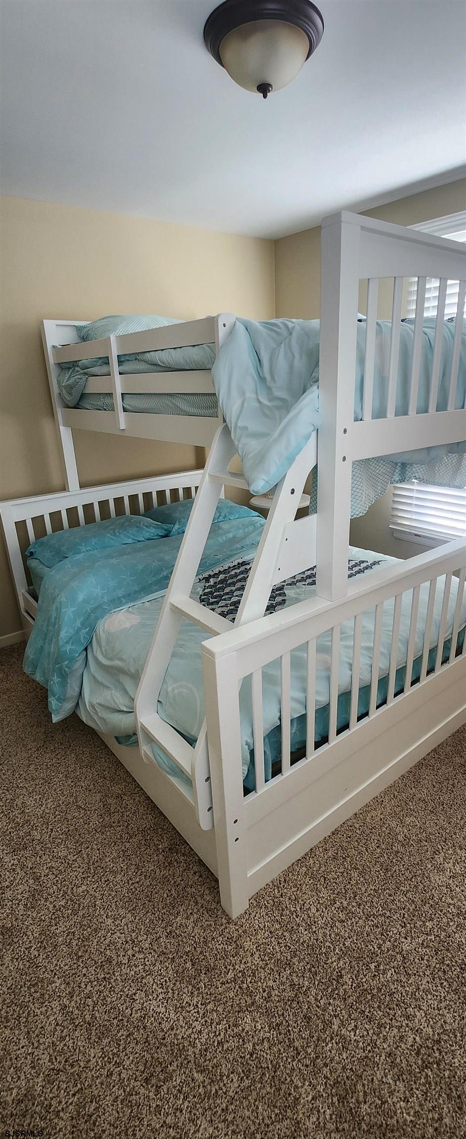 5217 Harbor Beach Boulevard, Unit SEA POINT Brigantine, NJ 08203 - Photo 29 of 38 a view of a porch with two windows and stairs