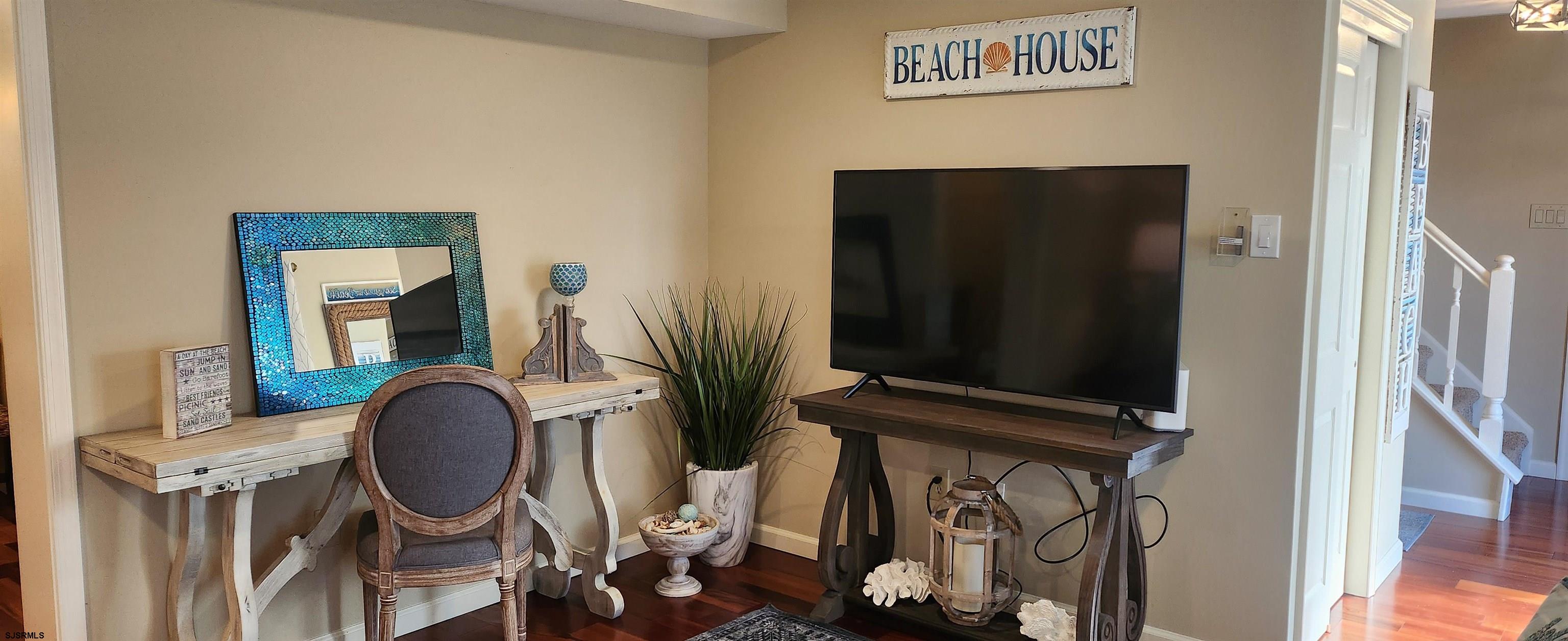 5217 Harbor Beach Boulevard, Unit SEA POINT Brigantine, NJ 08203 - Photo 6 of 38 a view of living room with furniture and a flat screen tv