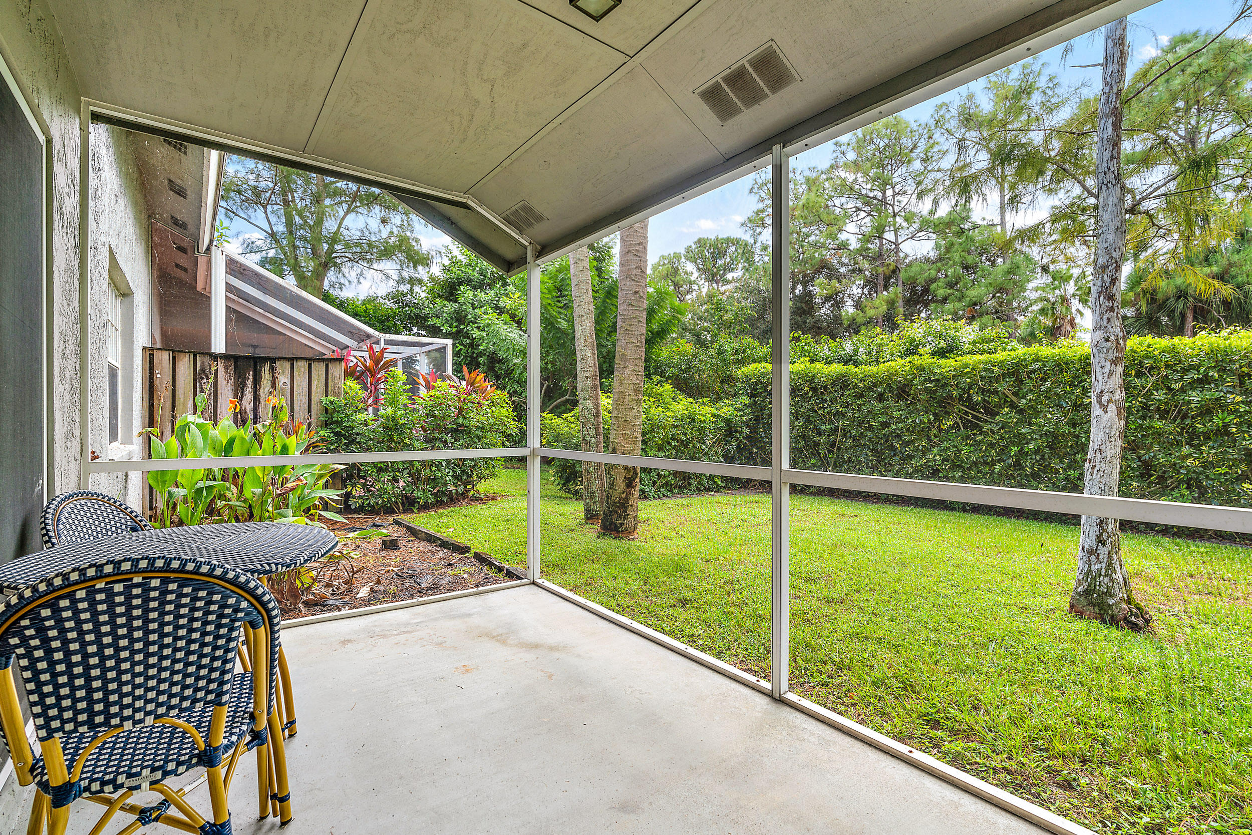 13206 Quiet Woods Road, Unit B Wellington, FL 33414 - Photo 15 of 18 Screened in patio