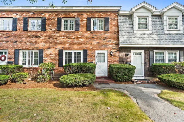 a front view of a house with swimming pool
