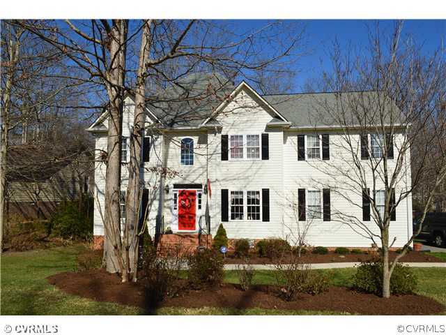 4706 Twin Cedars Road Chester, VA 23831 - Photo 1 of 24 a view of a white house with a big yard and large tree