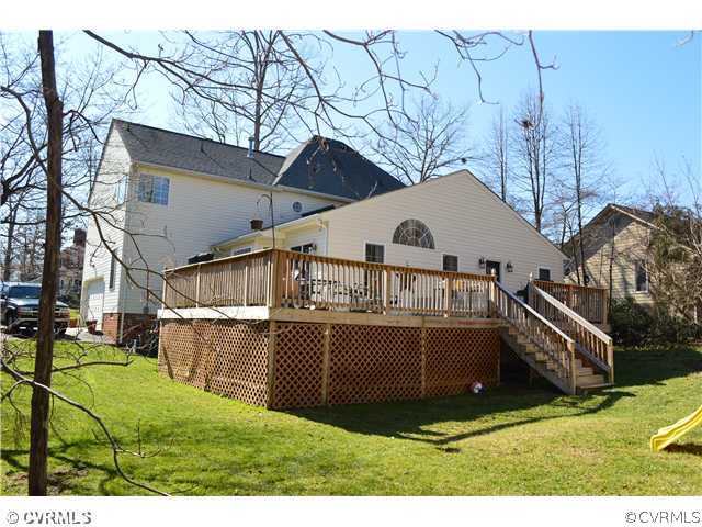 4706 Twin Cedars Road Chester, VA 23831 - Photo 19 of 24 a view of a house with backyard