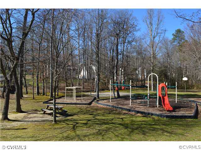 4706 Twin Cedars Road Chester, VA 23831 - Photo 24 of 24 a view of outdoor space with garden and trees