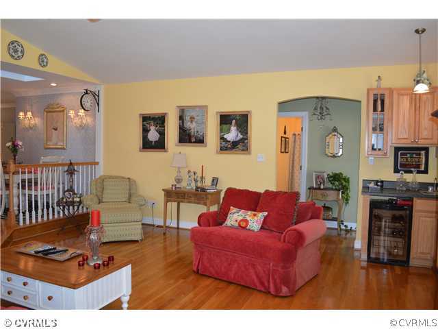 4706 Twin Cedars Road Chester, VA 23831 - Photo 9 of 24 a living room with furniture and wooden floor