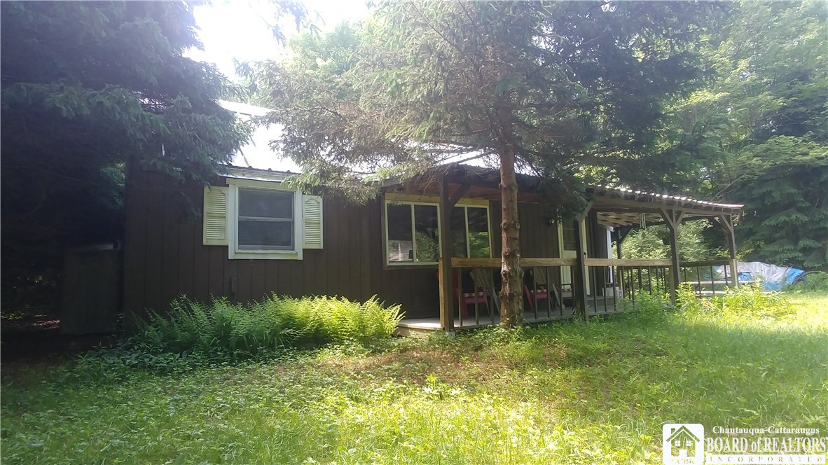 617 Swede Road Harmony, NY 14767 - Photo 1 of 1 Front view of cabin