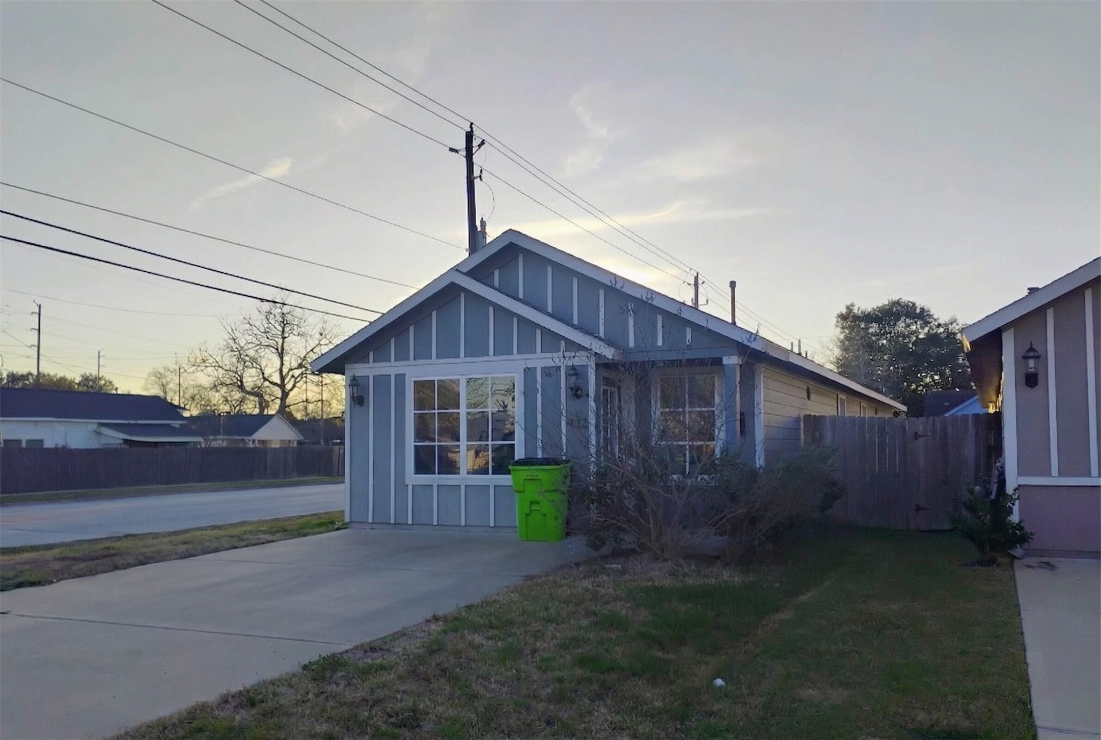 422 3rd Street Rosenberg, TX 77471 - Photo 2 of 14 a view of a small house with wooden fence