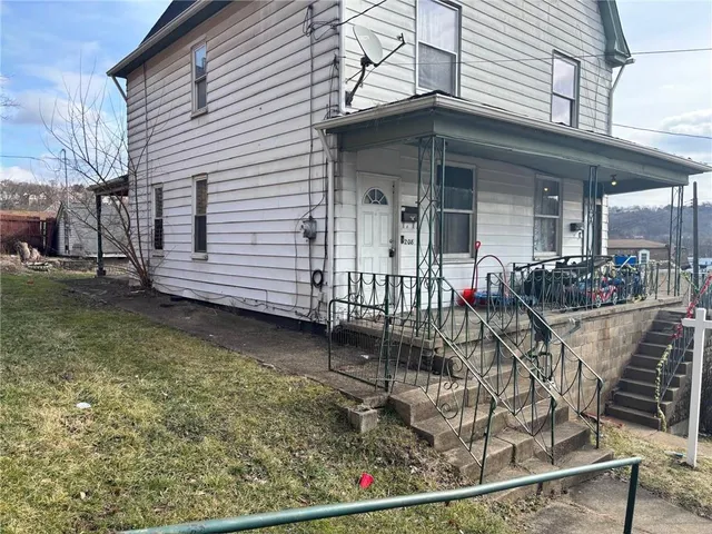a view of a house with patio
