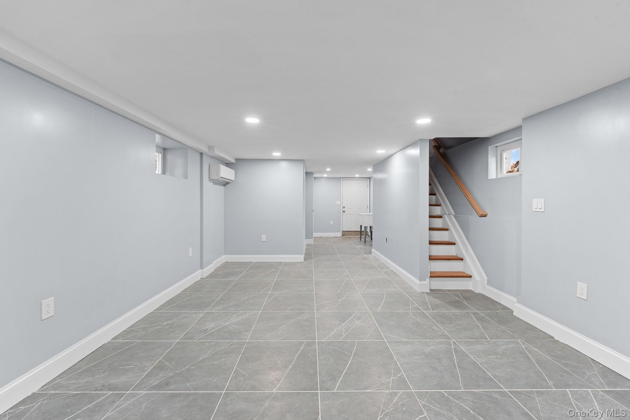 142-35 Sutter Avenue Queens, NY 11436 - Photo 15 of 21 a view of an empty room with stairs