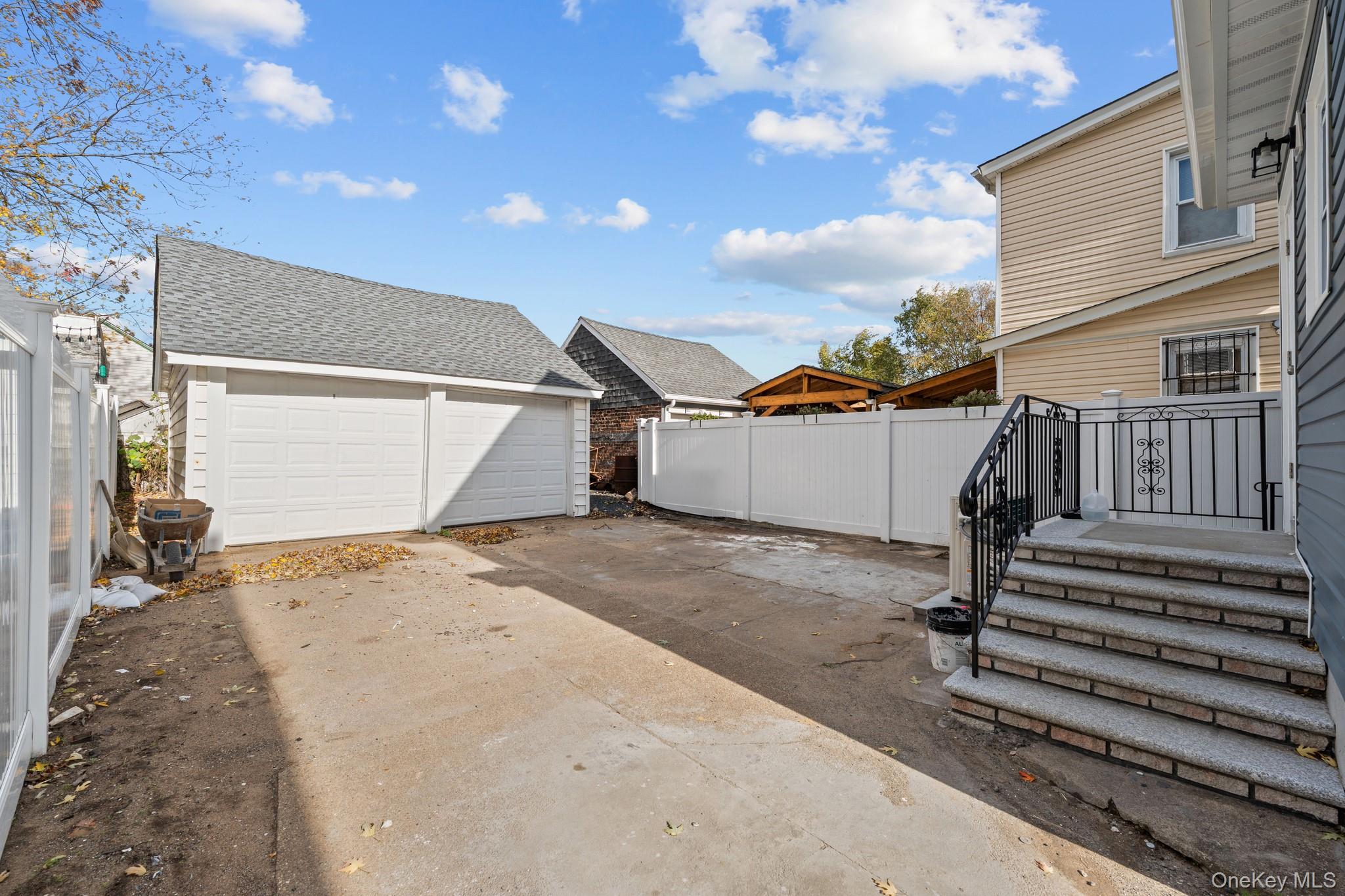 142-35 Sutter Avenue Queens, NY 11436 - Photo 17 of 21 a view of a backyard