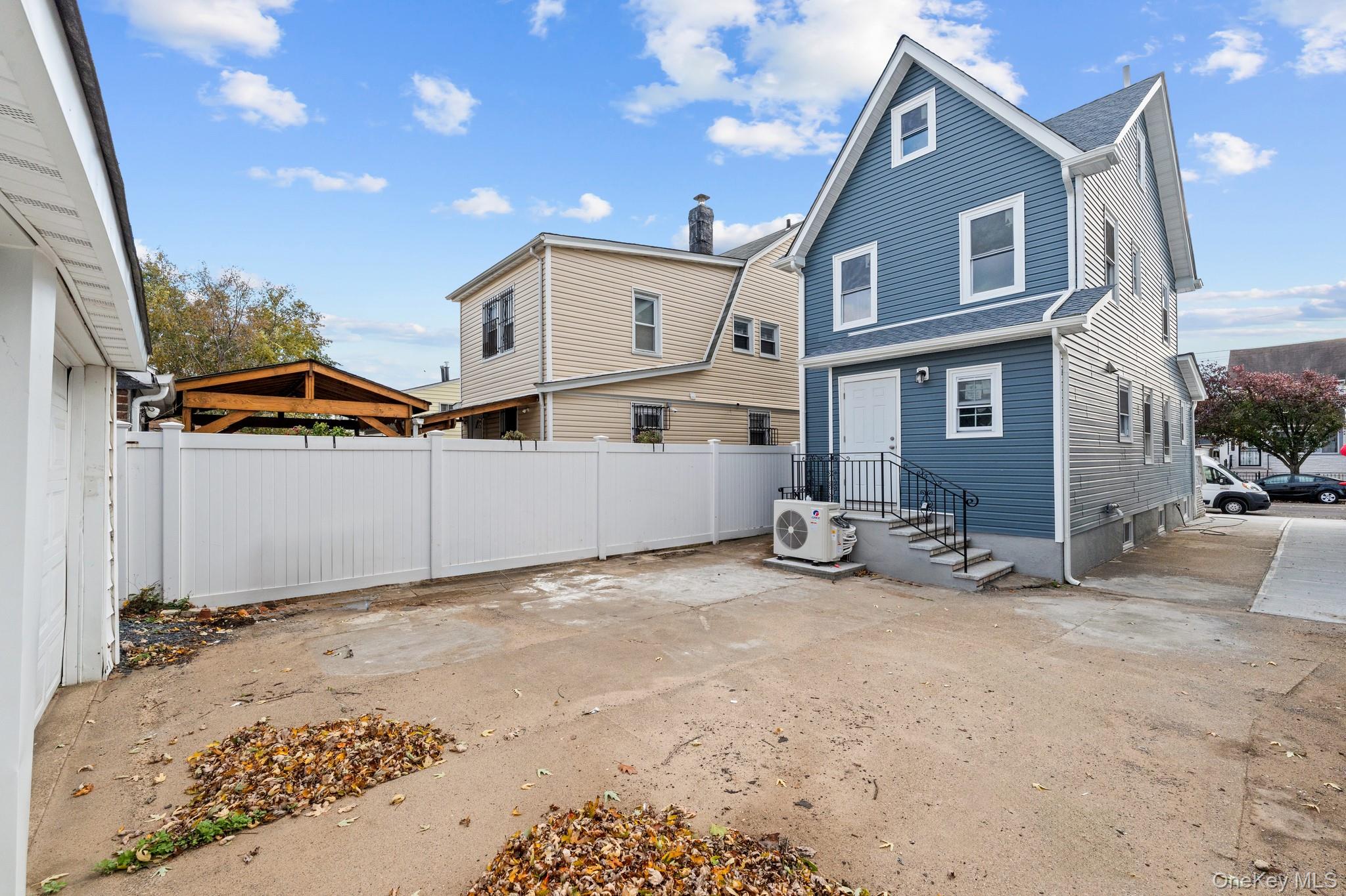 142-35 Sutter Avenue Queens, NY 11436 - Photo 19 of 21 a view of a house with a patio