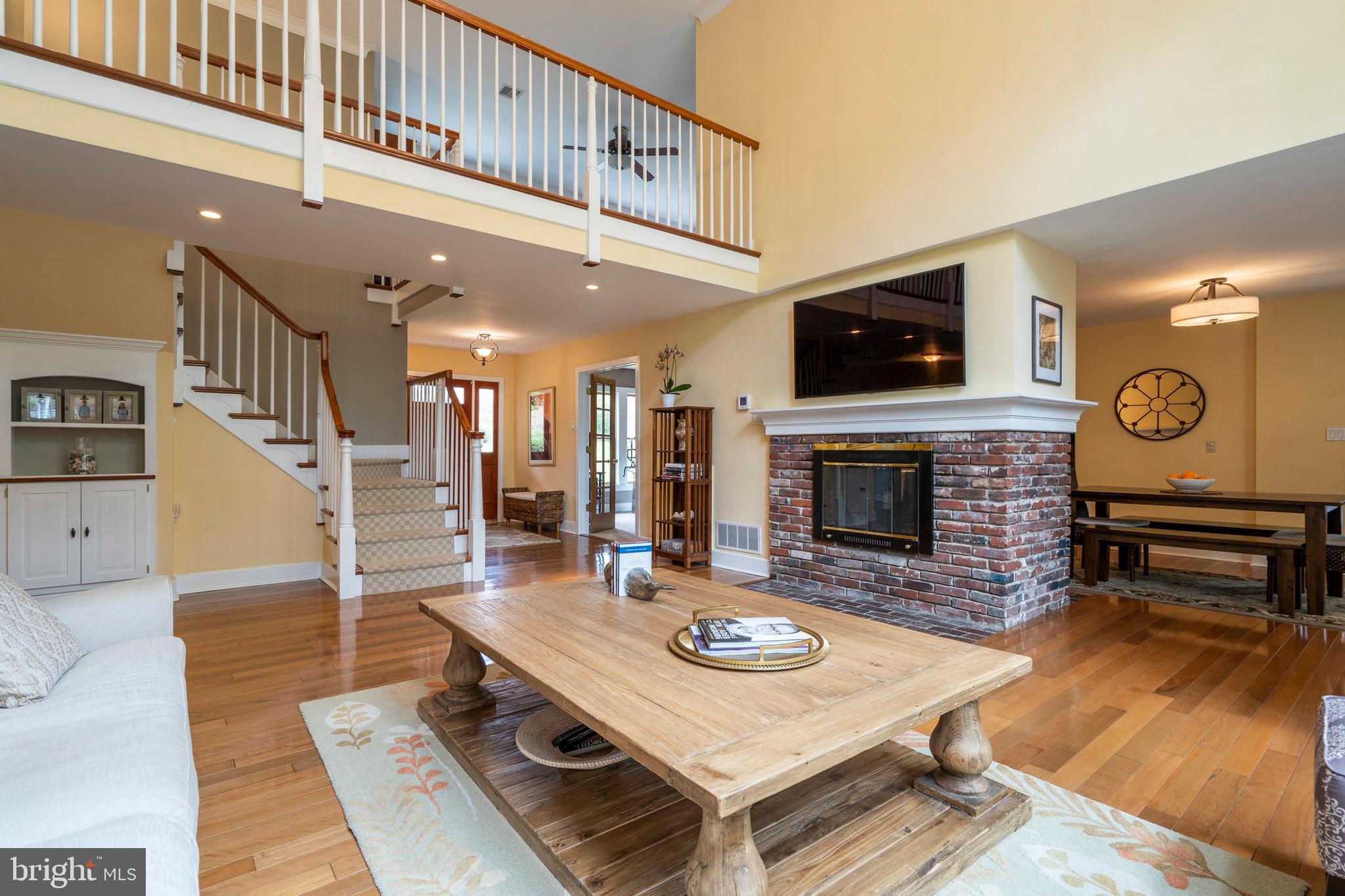 65 Crestline Road Wayne, PA 19087 - Photo 9 of 52 2-sided fireplace from living room to dining room