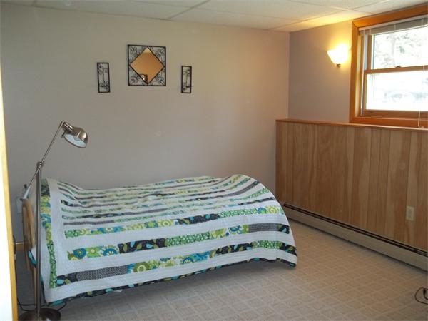 125 Dunn Road Ashburnham, MA 01430 - Photo 11 of 18 a bedroom with a bed and a window