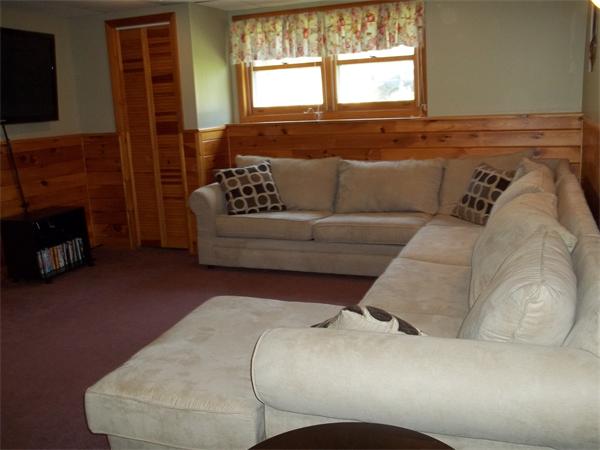 125 Dunn Road Ashburnham, MA 01430 - Photo 13 of 18 a living room with furniture and a fireplace