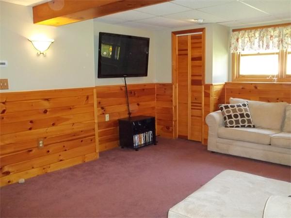 125 Dunn Road Ashburnham, MA 01430 - Photo 14 of 18 a living room with furniture and a flat screen tv