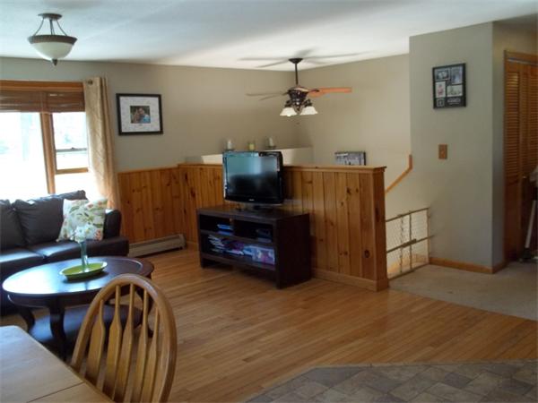 125 Dunn Road Ashburnham, MA 01430 - Photo 5 of 18 a living room with furniture and a flat screen tv
