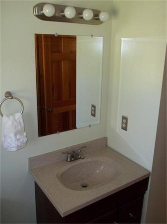 125 Dunn Road Ashburnham, MA 01430 - Photo 7 of 18 a bathroom with a sink vanity and a mirror