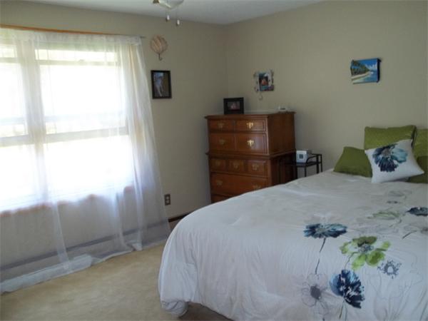 125 Dunn Road Ashburnham, MA 01430 - Photo 10 of 18 a bedroom with a bed and window