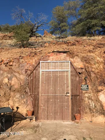 a view of a backyard of the house