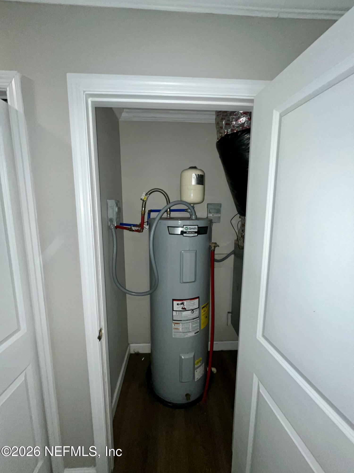2017 Talladega Road Jacksonville, FL 32209 - Photo 21 of 34 a close view of water heater room