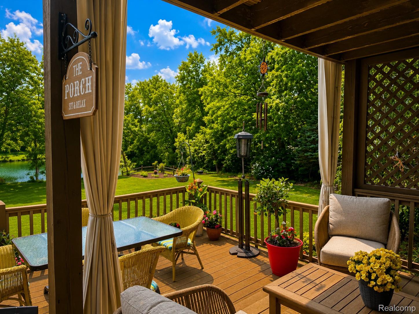 2495 North Custer Road Monroe, MI 48162 - Photo 36 of 44 Expansive outdoor deck with a pergola-style overhead structure and decorative lattice