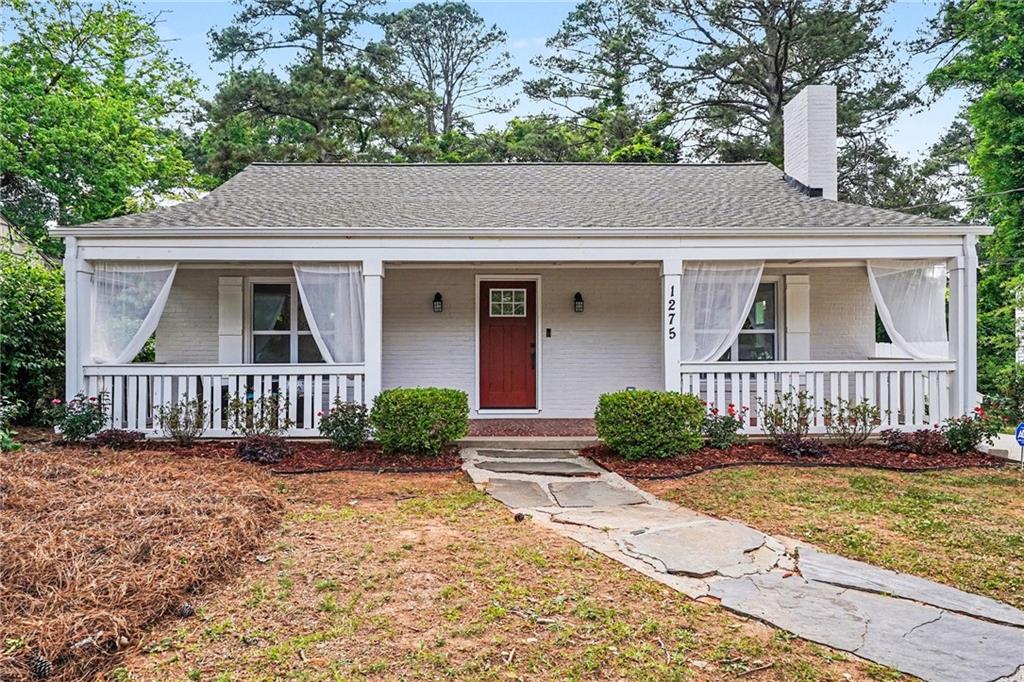 1275 Westridge Road Southwest Atlanta, GA 30311 - Photo 2 of 34 a front view of a house