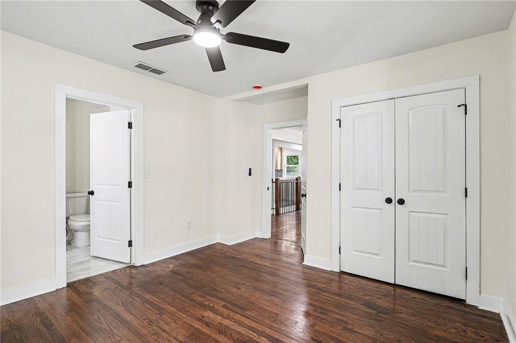 1275 Westridge Road Southwest Atlanta, GA 30311 - Photo 21 of 34 wooden floor in an empty room