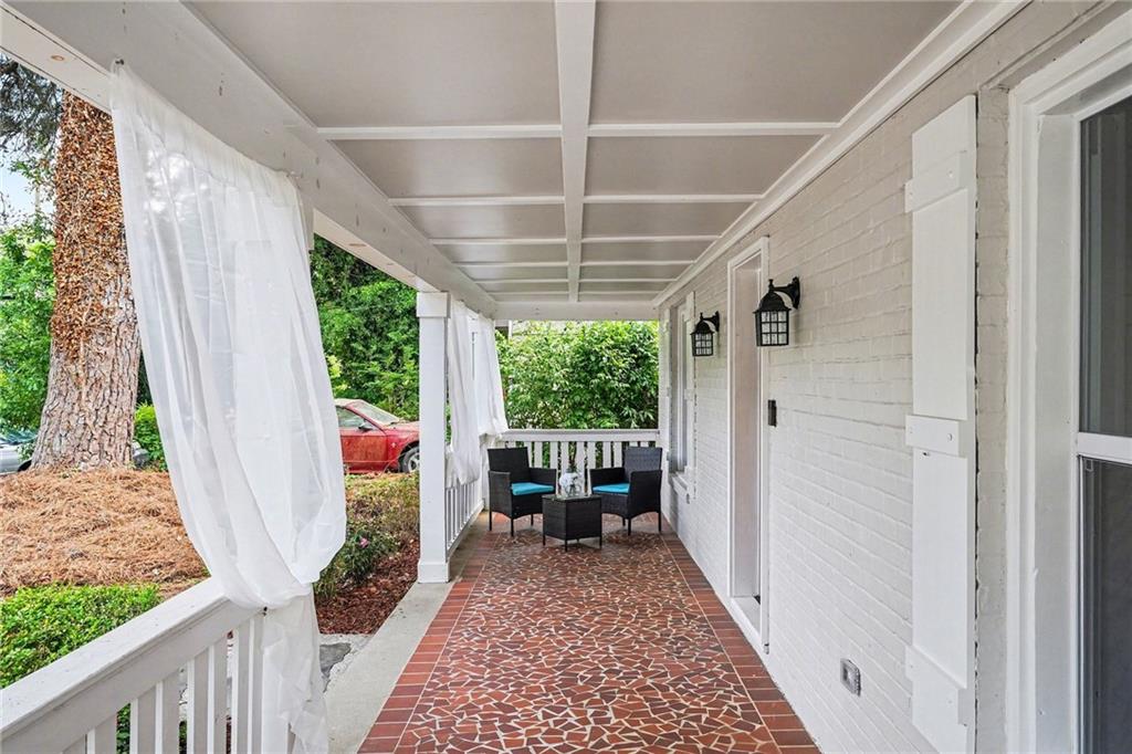 1275 Westridge Road Southwest Atlanta, GA 30311 - Photo 3 of 34 a view of a porch with furniture