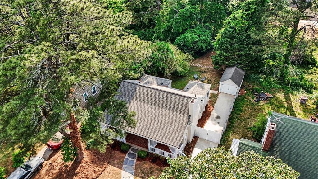 1275 Westridge Road Southwest Atlanta, GA 30311 - Photo 32 of 34 an aerial view of a house with a yard and tree s