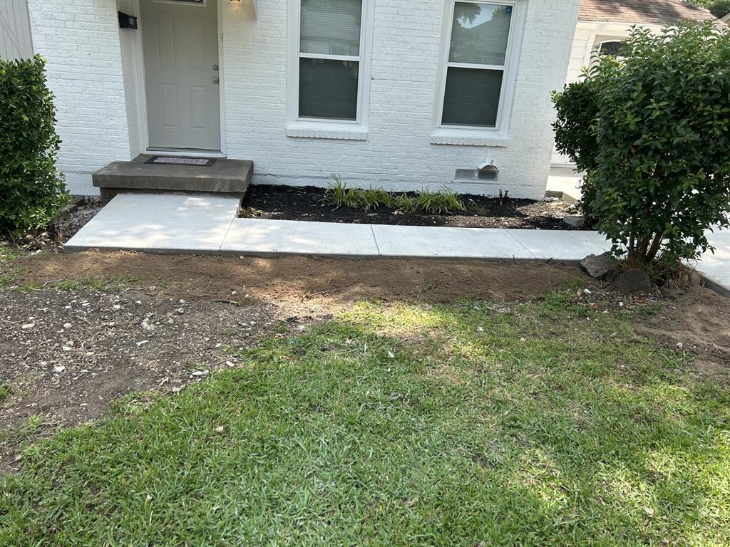 6318 Belgrade Avenue Dallas, TX 75227 - Photo 4 of 23 a view of a house with a yard