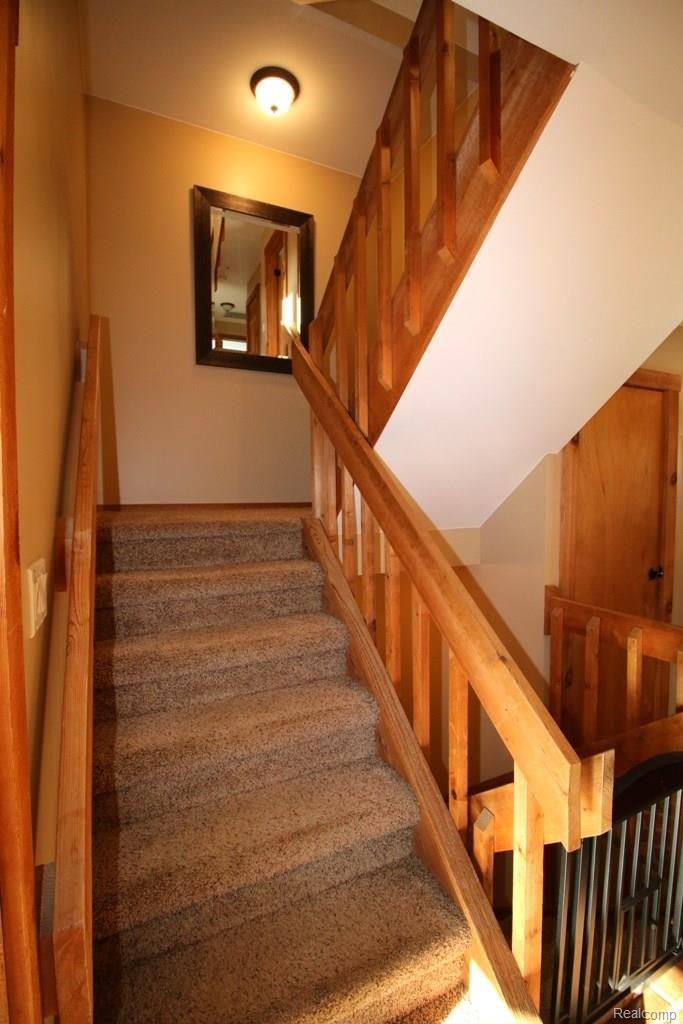 3770 Clyde Road Holly, MI 48442 - Photo 16 of 34 carpeted stairway
