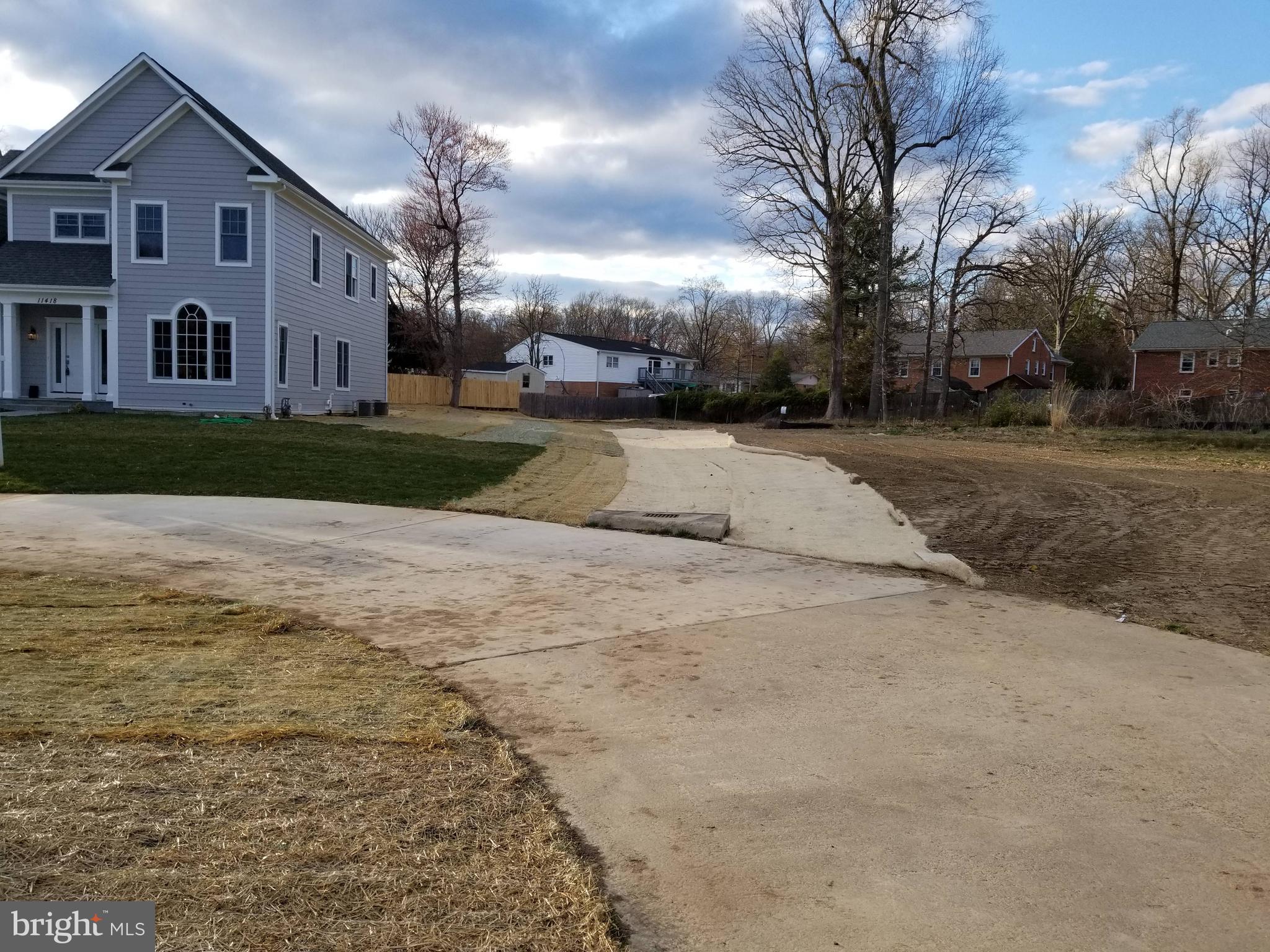 Lot 11 is left of New Home. Goes back to Trees