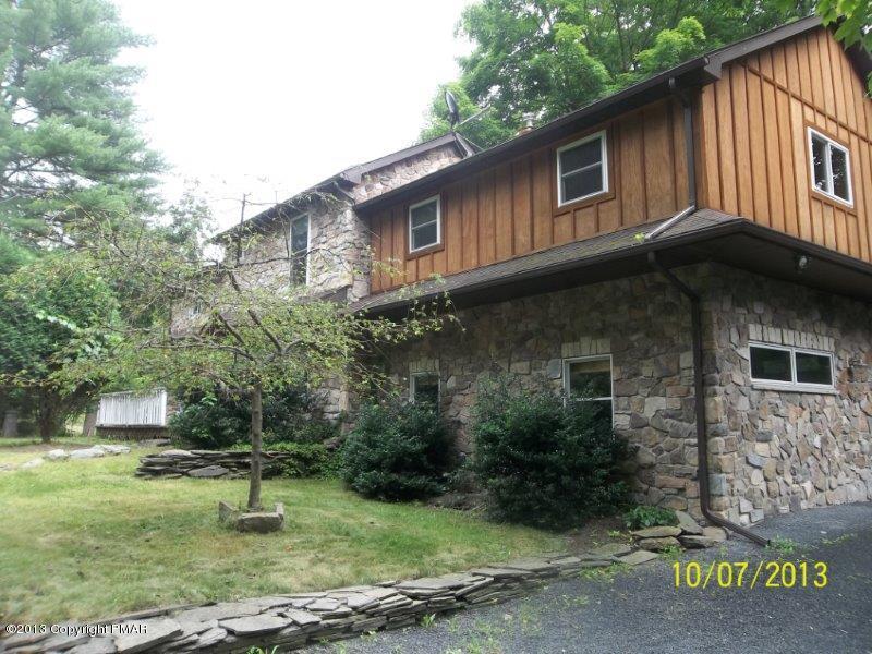 130 Donaldson Road Cresco, PA 18326 - Photo 15 of 20 a backyard of a house with lots of green space