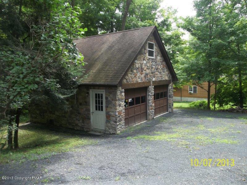 130 Donaldson Road Cresco, PA 18326 - Photo 19 of 20 a view of a barn in the middle of a yard