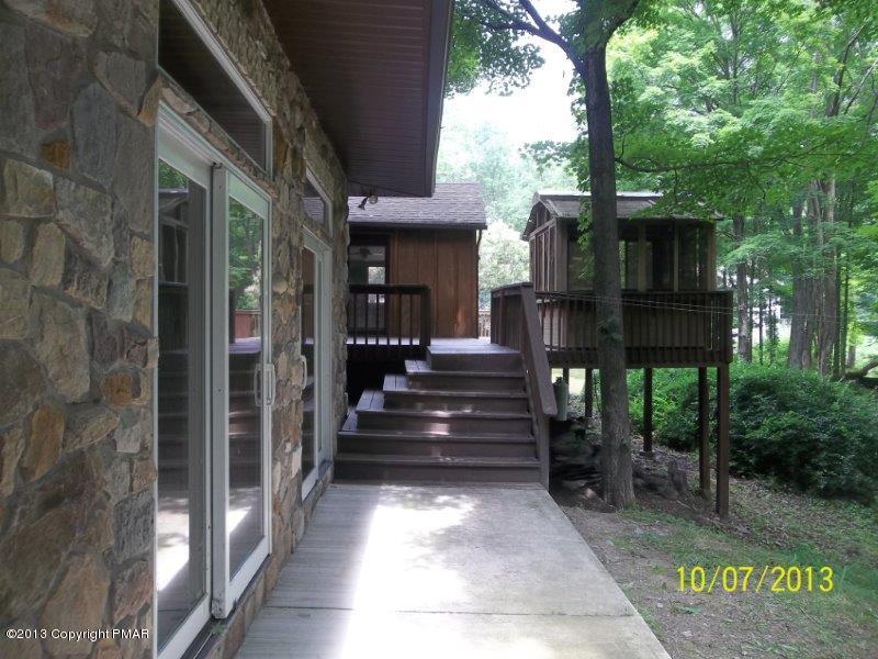 130 Donaldson Road Cresco, PA 18326 - Photo 20 of 20 a view of patio with table and chairs and potted plants