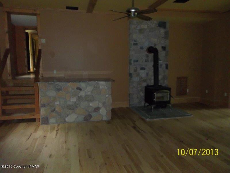 130 Donaldson Road Cresco, PA 18326 - Photo 6 of 20 a view of a hallway with wooden floor