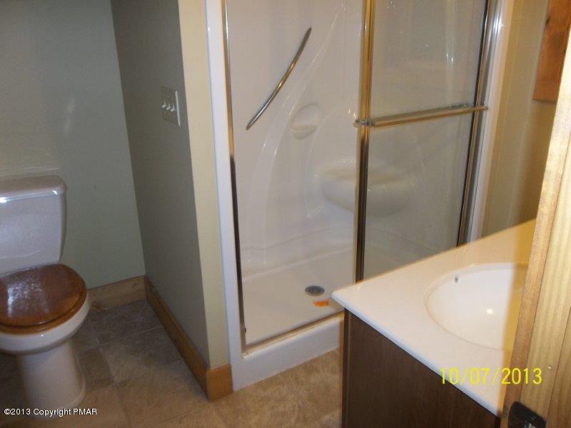 130 Donaldson Road Cresco, PA 18326 - Photo 10 of 20 a bathroom with a sink and toilet