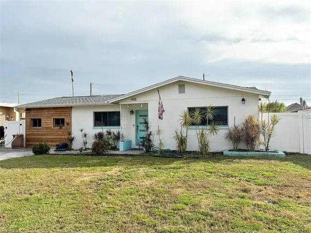 a view of a house with a big yard