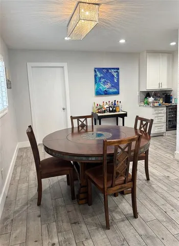 a view of a dining room with furniture