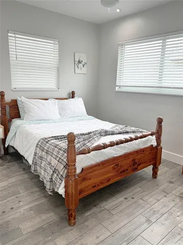 a bathroom with a toilet a sink and a mirror