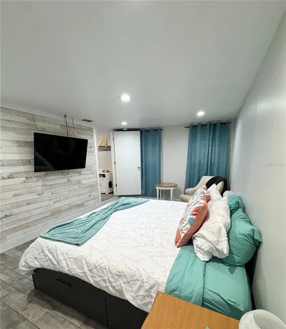 a bathroom with a shower and a sink