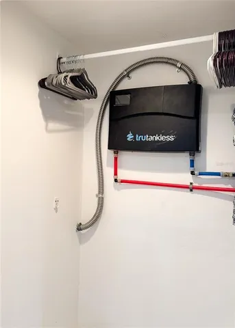 a bathroom with a tub and shower