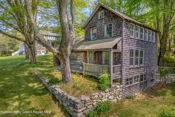 a view of a lake with a yard