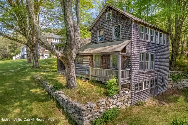 a view of a lake with a yard