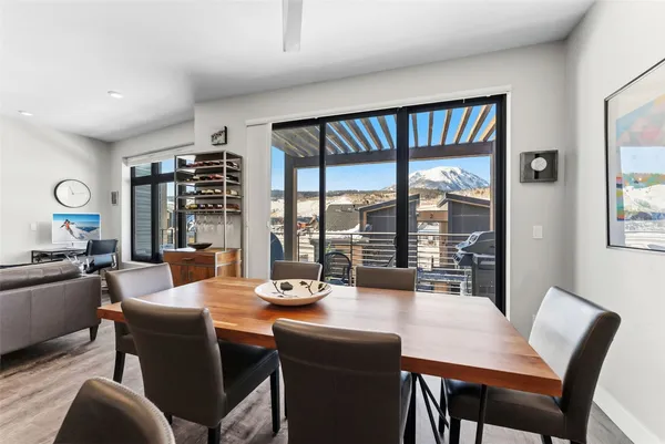 a dining room with large window