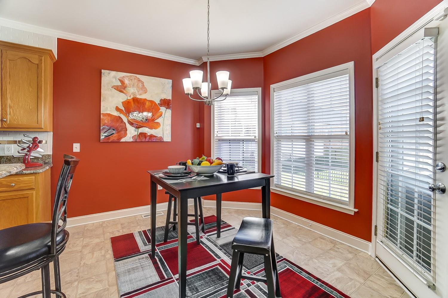 306 Wendover Drive Locust, NC 28097 - Photo 15 of 42 a table and chairs in a room