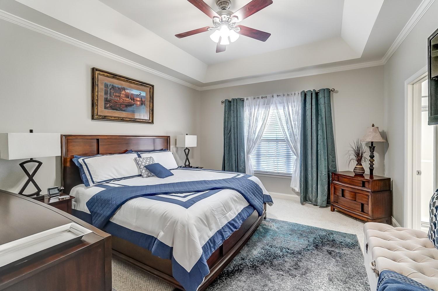 306 Wendover Drive Locust, NC 28097 - Photo 23 of 42 a bedroom with bed and wooden floor